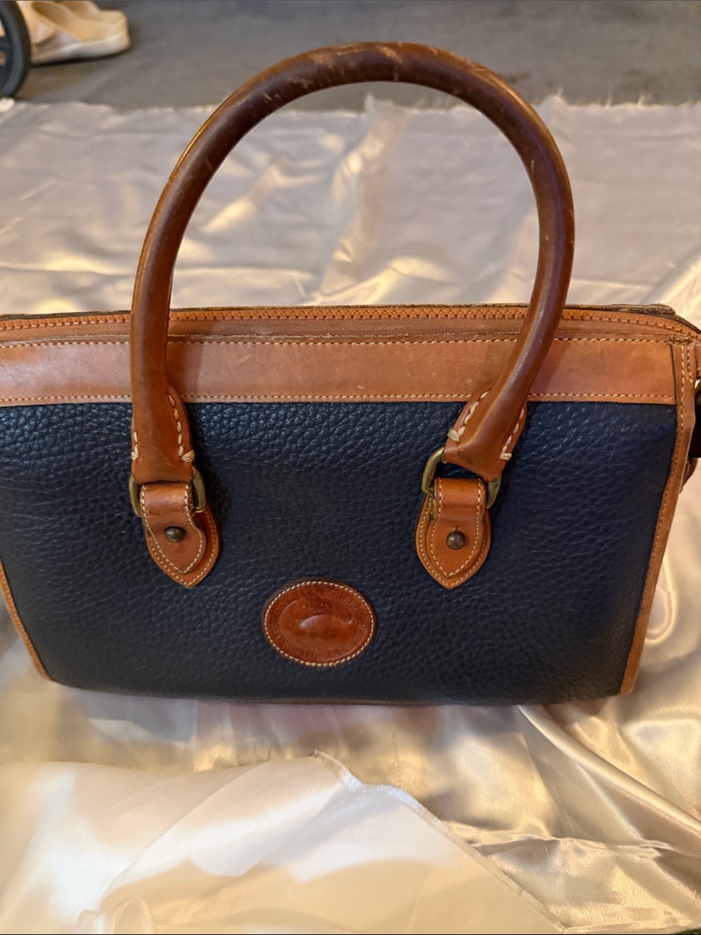 Dooney & Bourke Black Pebbled Leather Satchel with Brown Trim and Handles